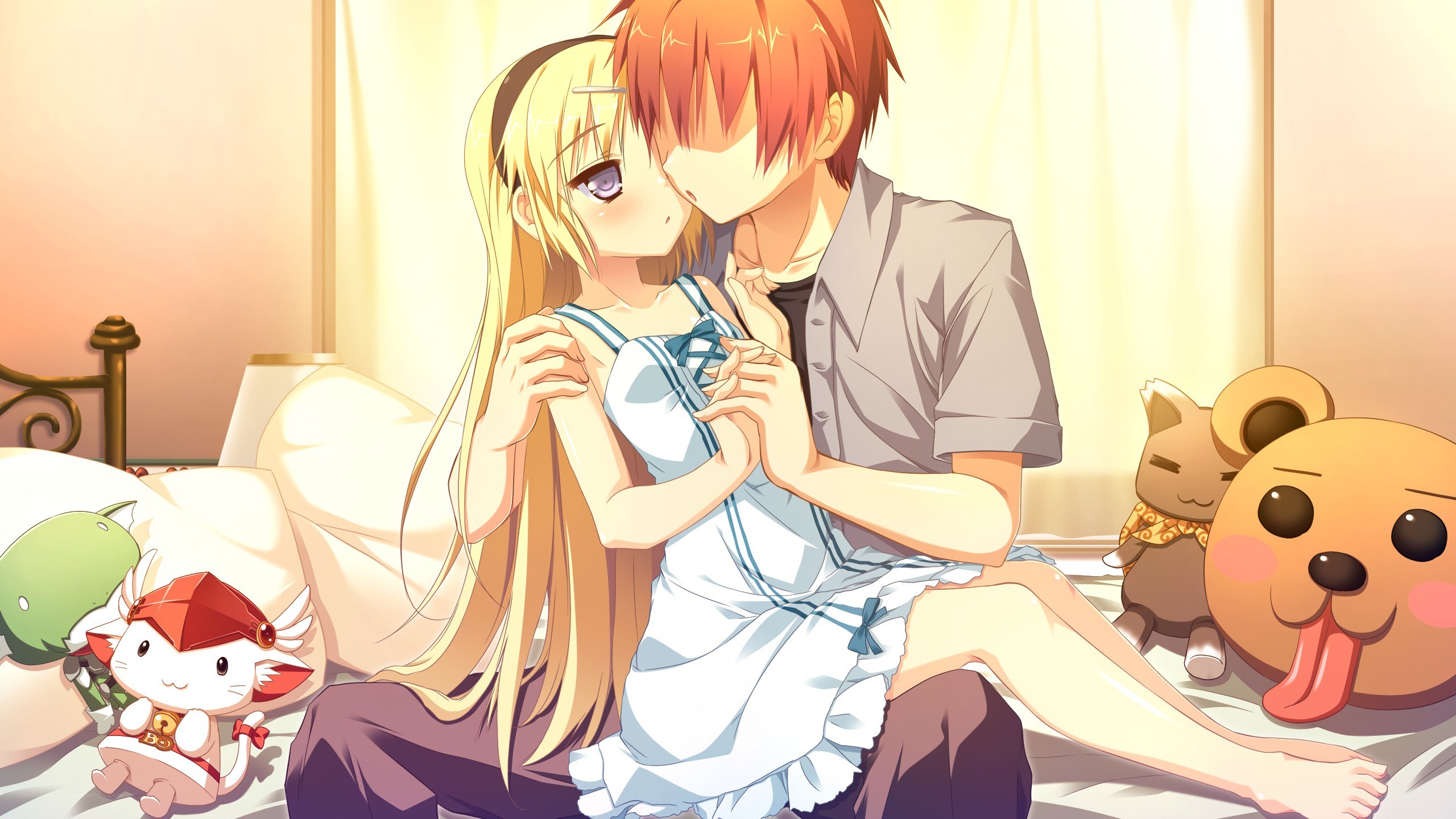 couple sharing a kiss on bed