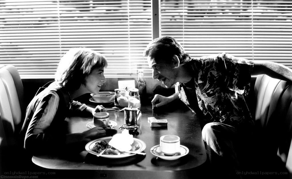 Couple sharing a meal at diner