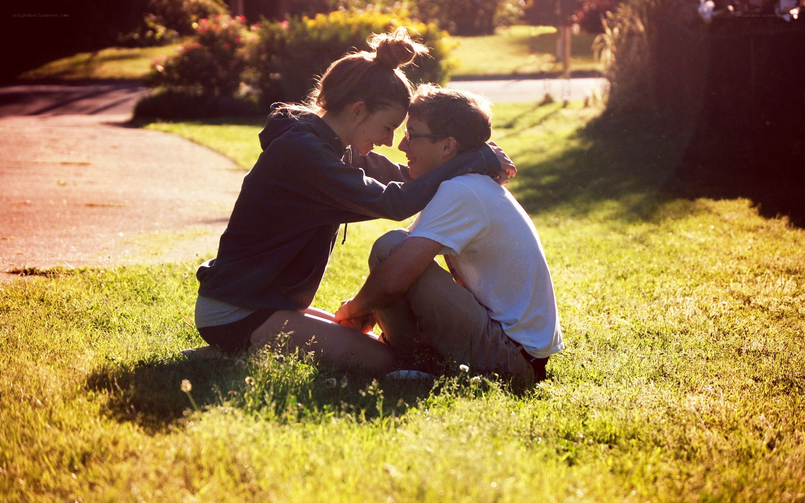 Couple sharing a moment on grass