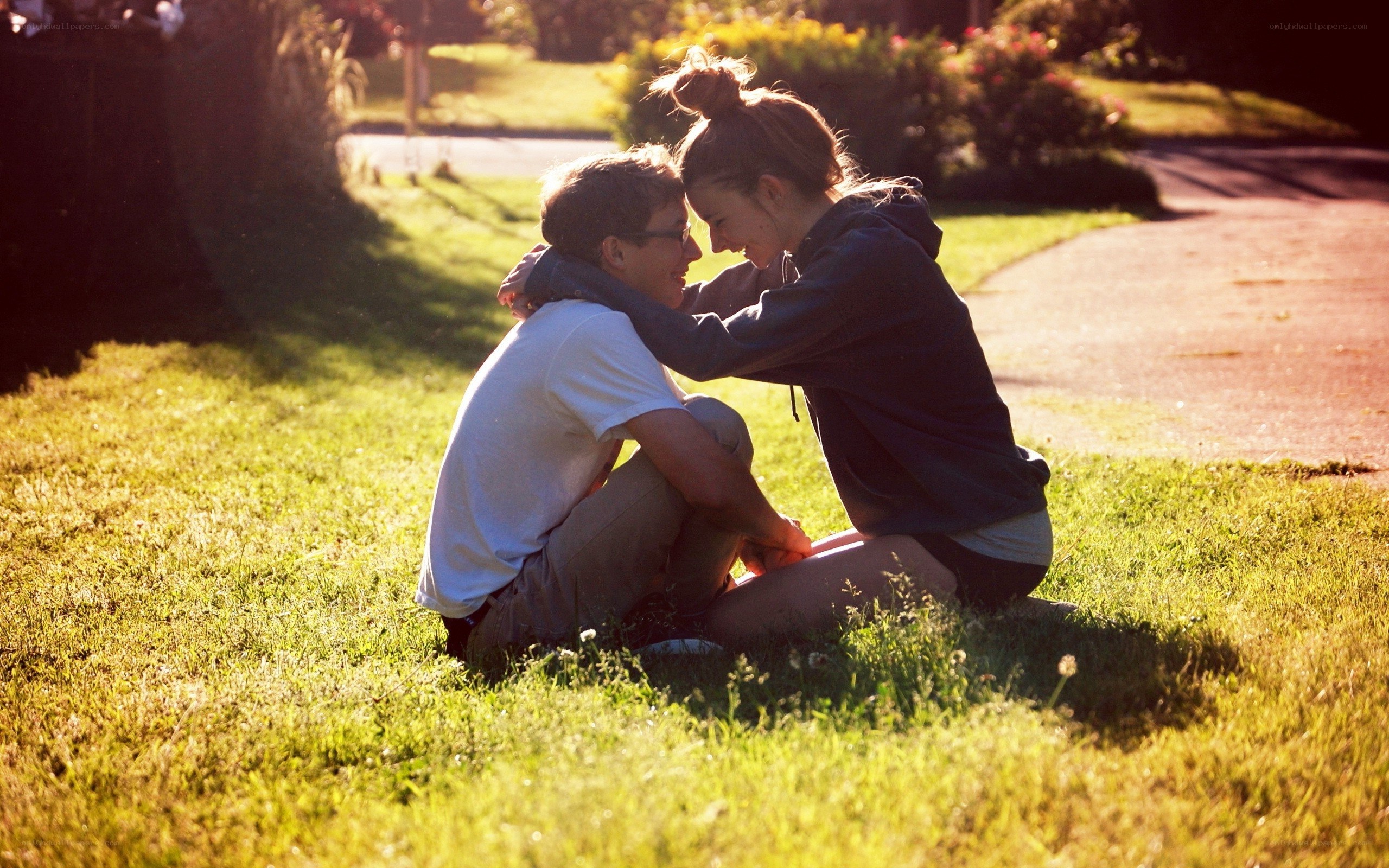 Couple sharing a moment on grass