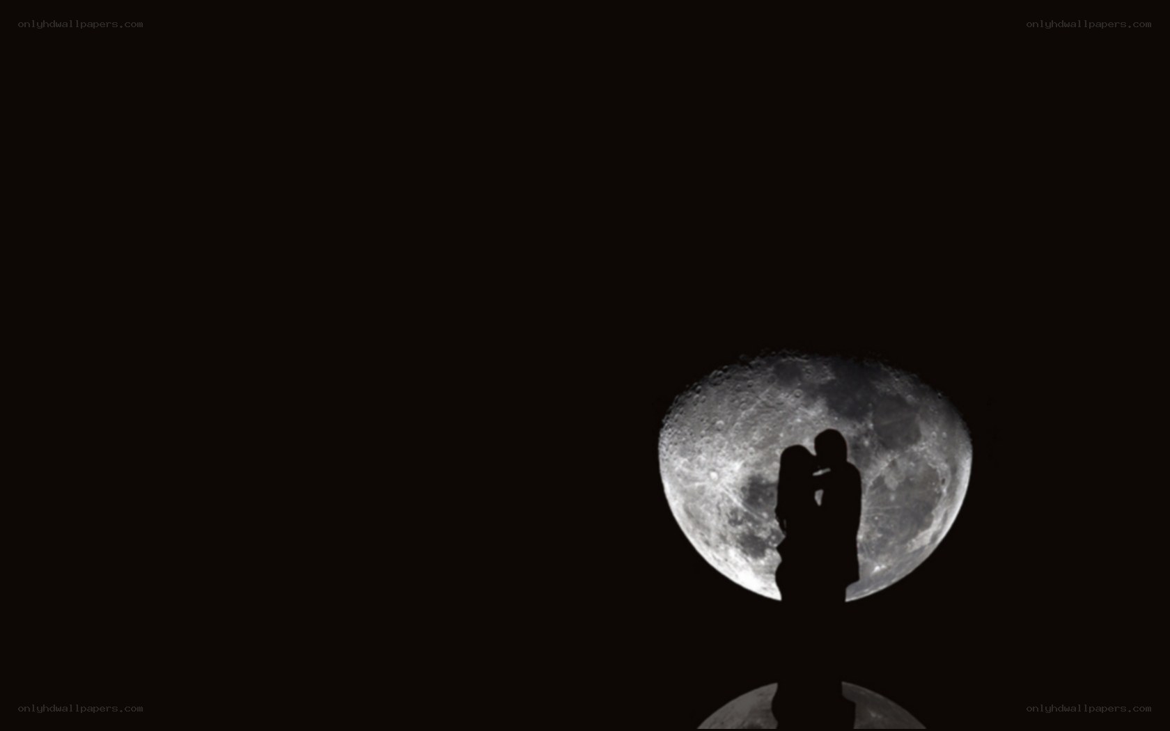 couple silhouette on moon