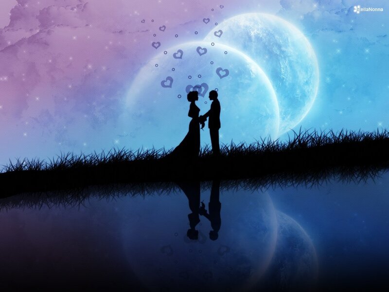 Couple silhouette under moon