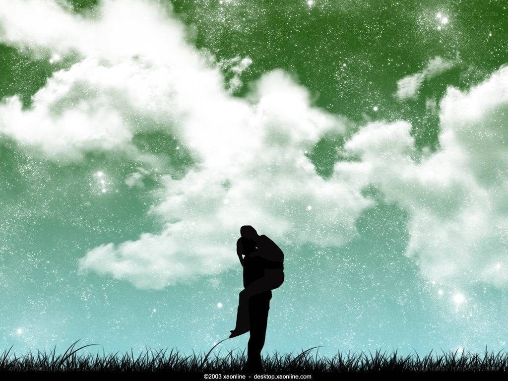 Couple silhouette under starry sky