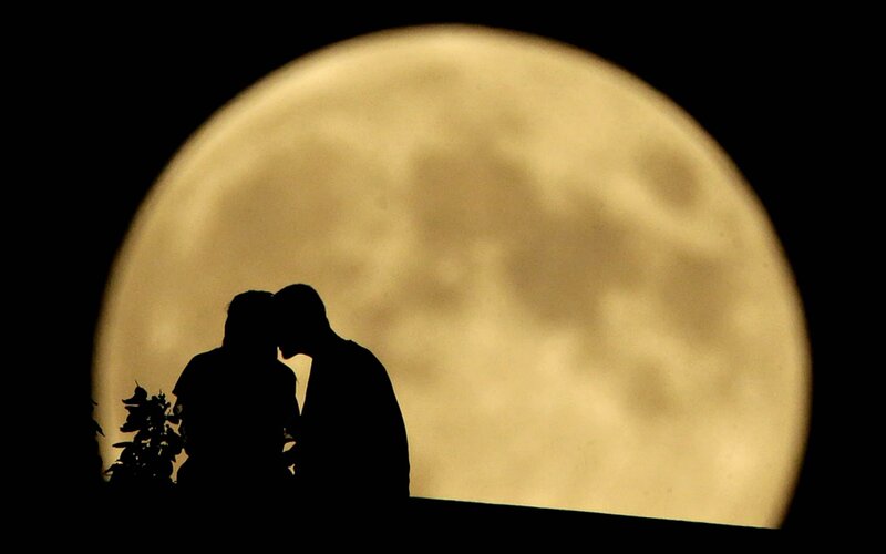 Couple Silhouetted Against Moon — Black