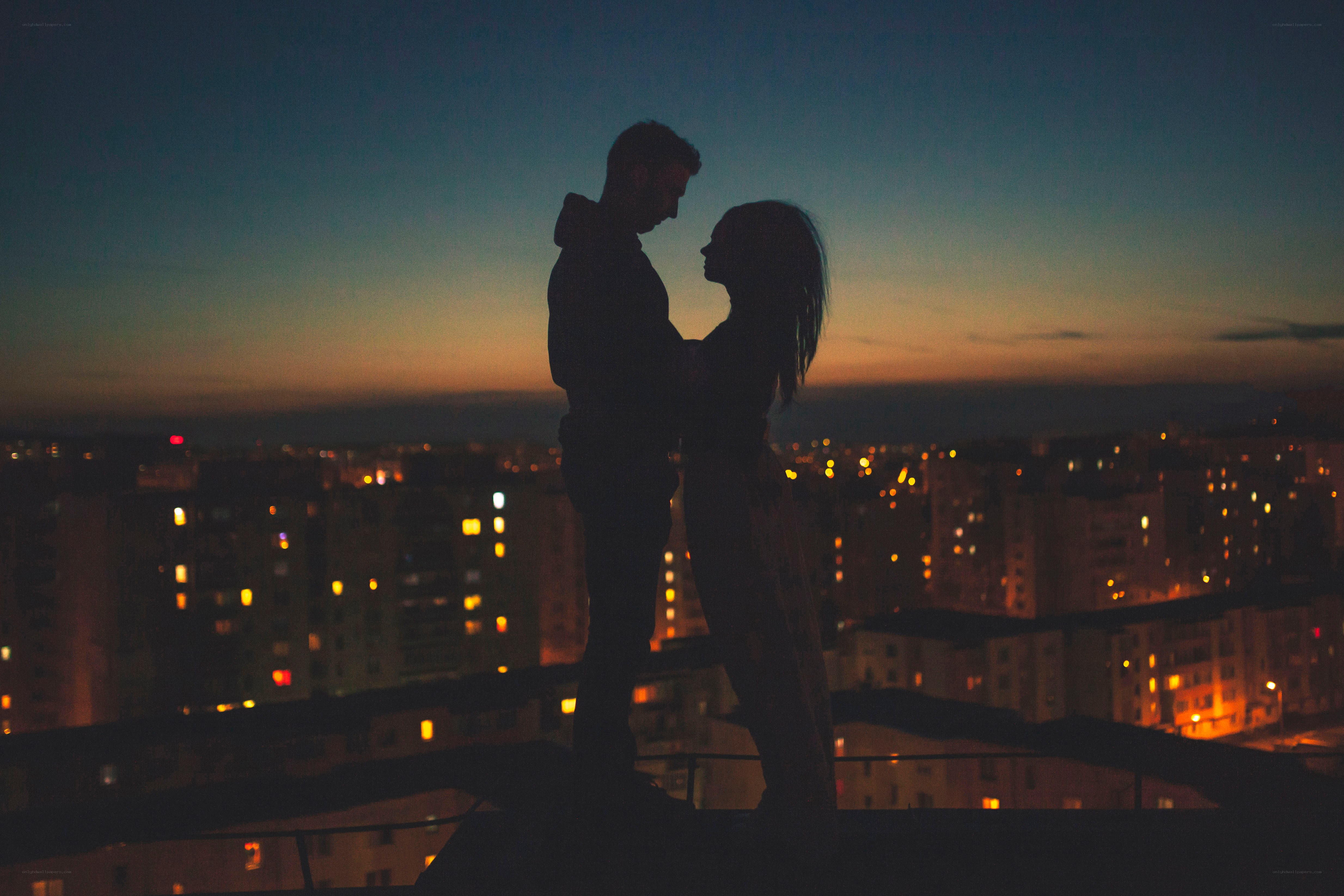 Couple silhouetted at dusk