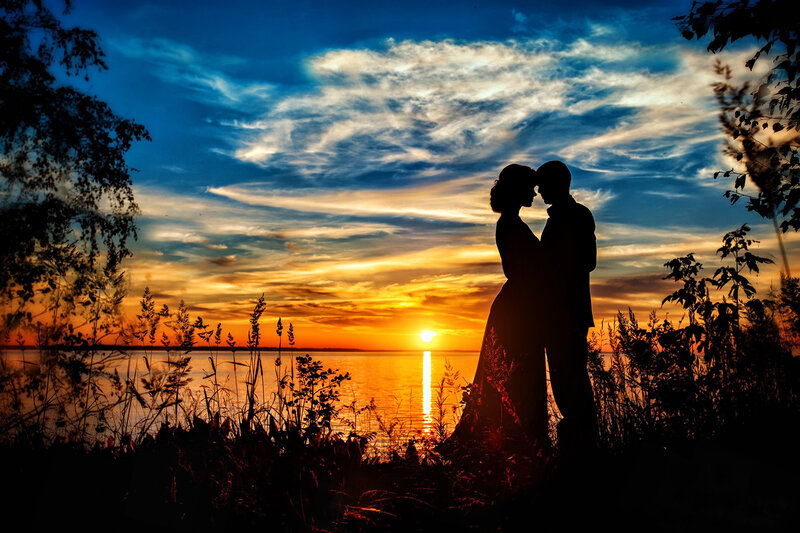 Couple Silhouetted at Sunset — Blue, Dramatic