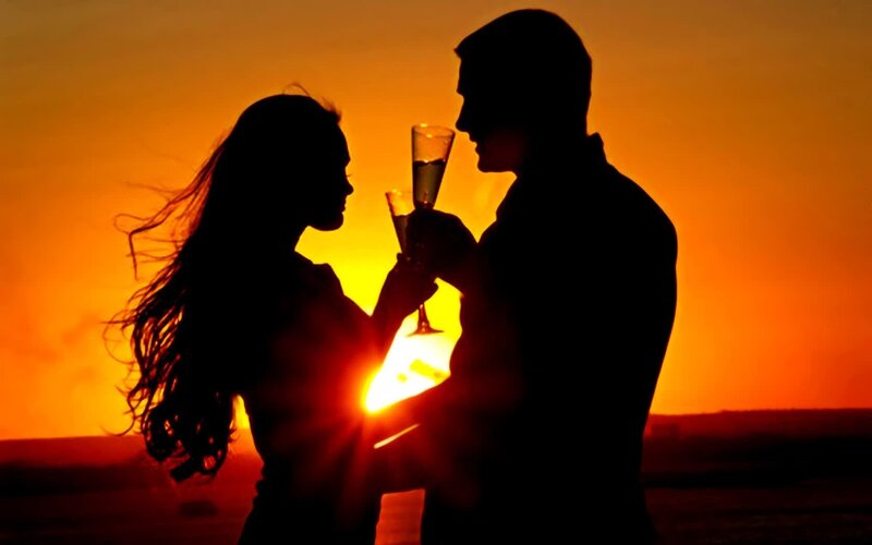 Couple Silhouetted at Sunset — Orange