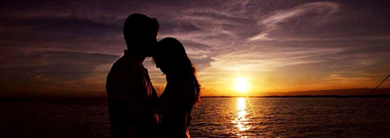 Couple Silhouetted at Sunset — Purple