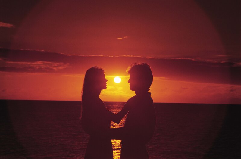 Couple Silhouetted at Sunset — Red, Romantic