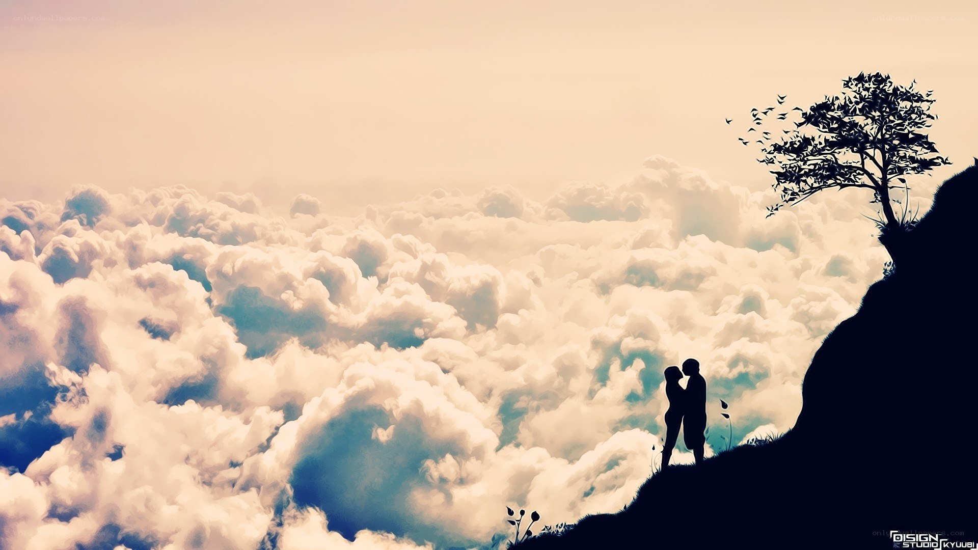 Couple silhouetted on a cliff
