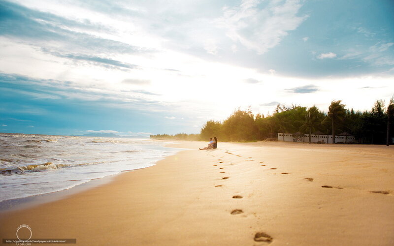 Couple Sitting on Beach — Beige