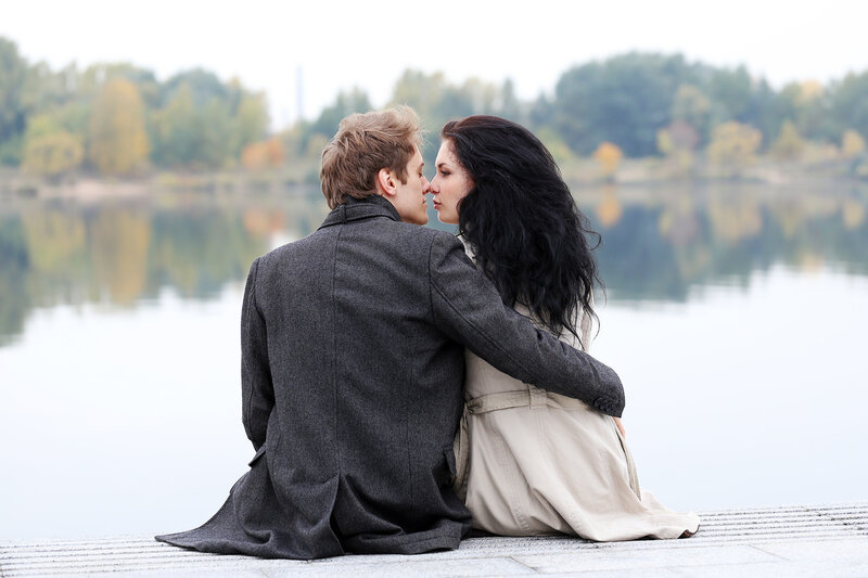 Couple Sitting on Dock — Gray