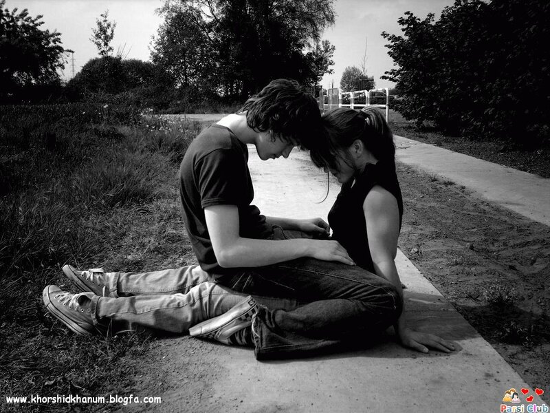 Couple Sitting on Ground