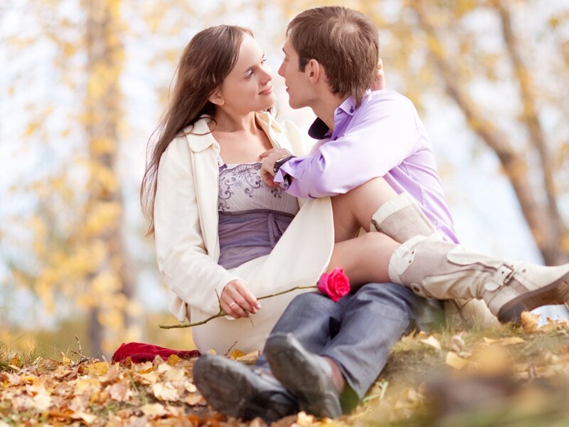 Couple Sitting on Ground — Yellow