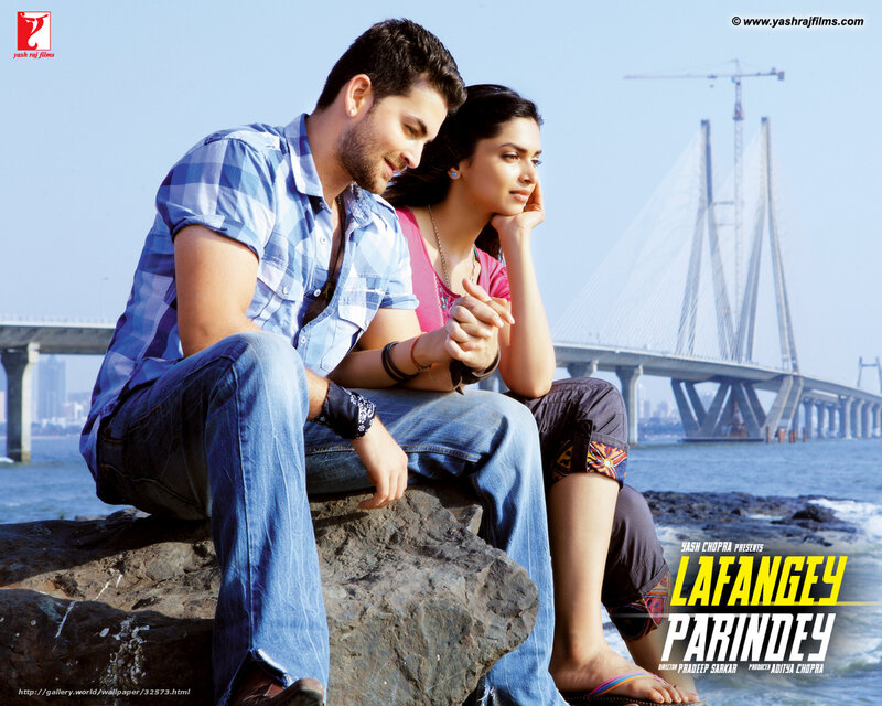Couple Sitting on Rock