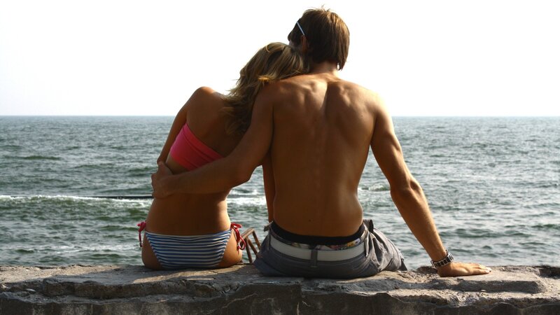 Couple Sitting on Wall — Blue, Serene