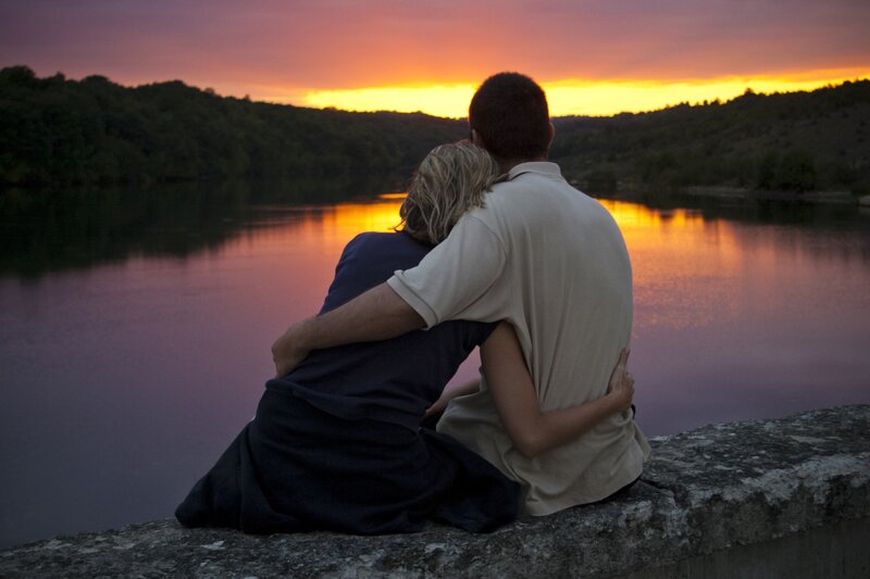 Couple Sitting on Wall — Purple