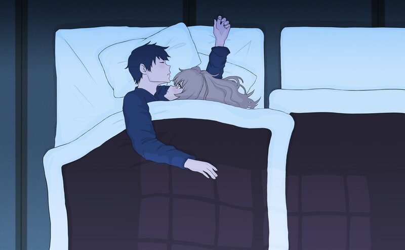 Couple sleeping in bed