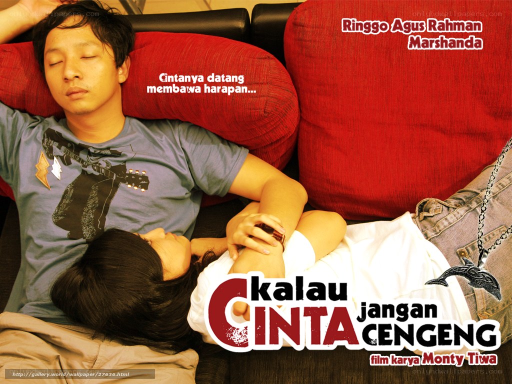 Couple sleeping on couch