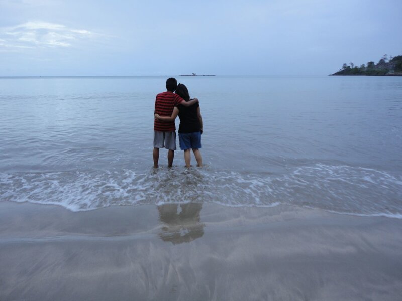 Couple Standing in Water