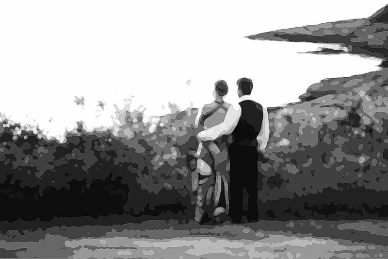 Couple Standing on Cliff