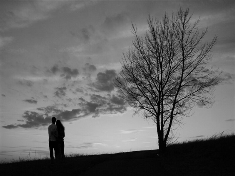 Couple Standing on Hill