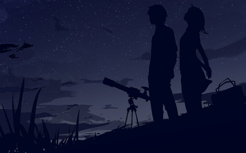 Couple stargazing at night