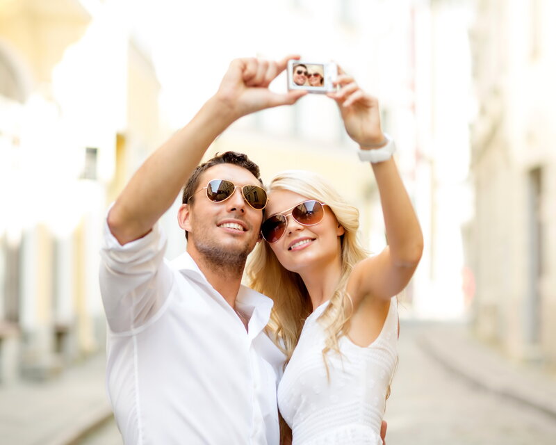 Couple Taking Selfie — White