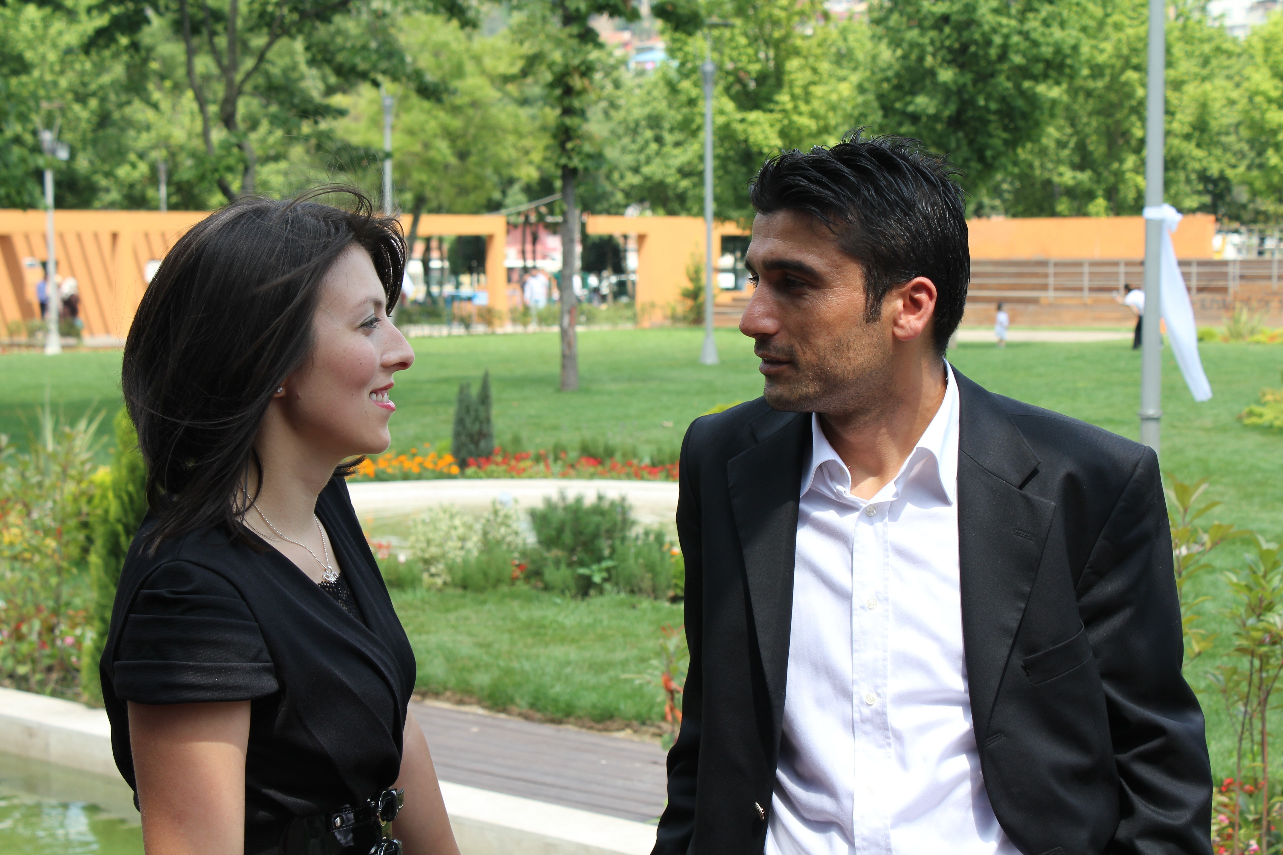 Couple talking in a park
