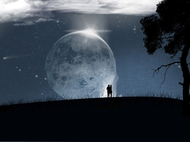 Couple under a giant moon