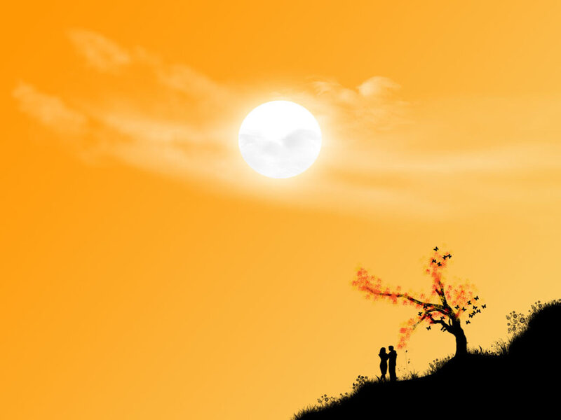 Couple under a glowing sky