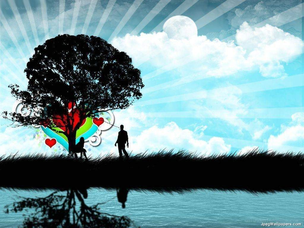 Couple under a tree by the water