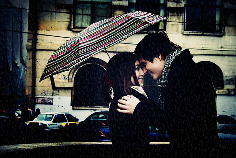 Couple under an umbrella in the rain