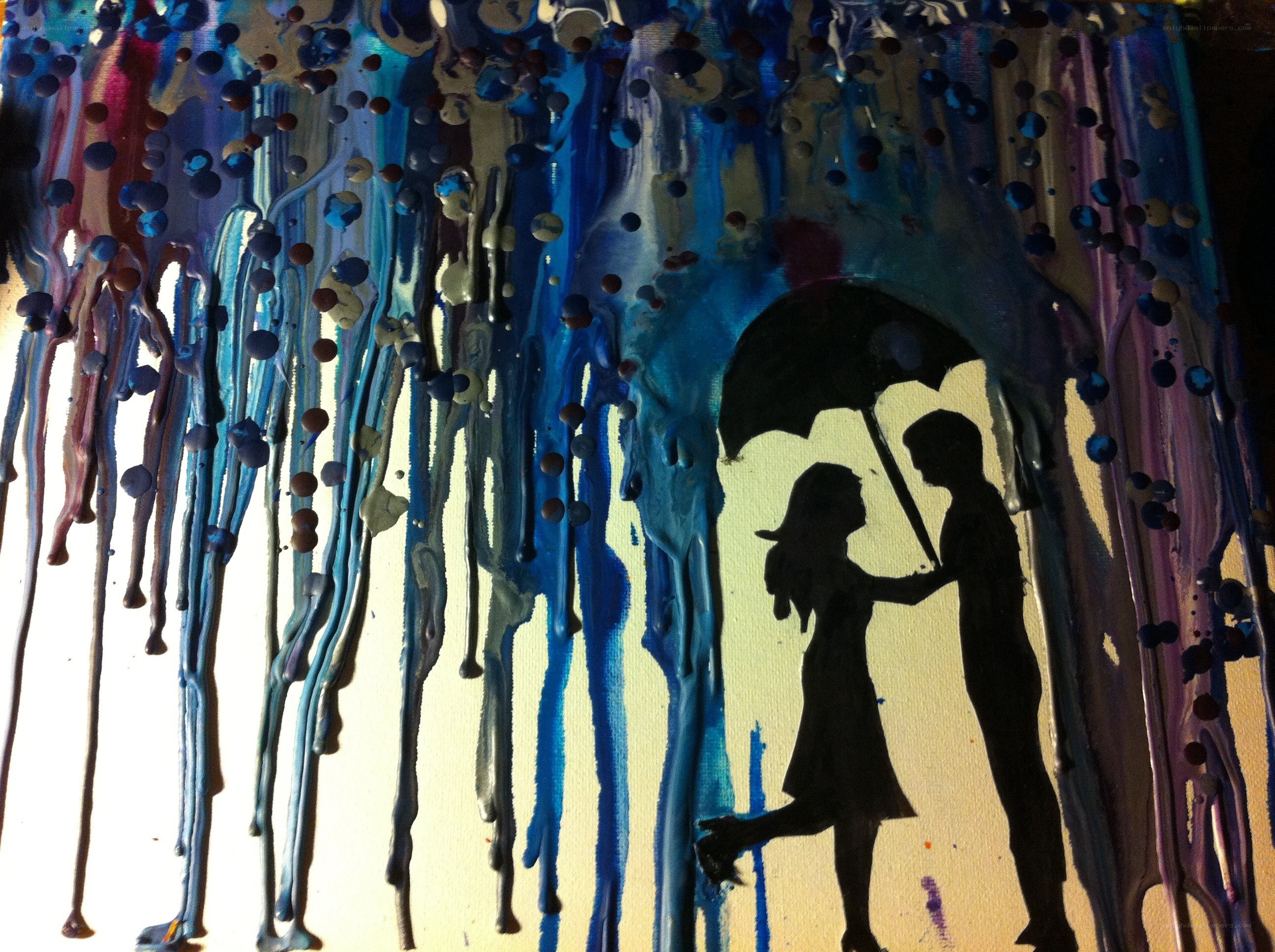 Couple under an umbrella silhouette