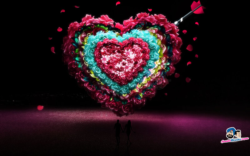 Couple under Heart Sculpture