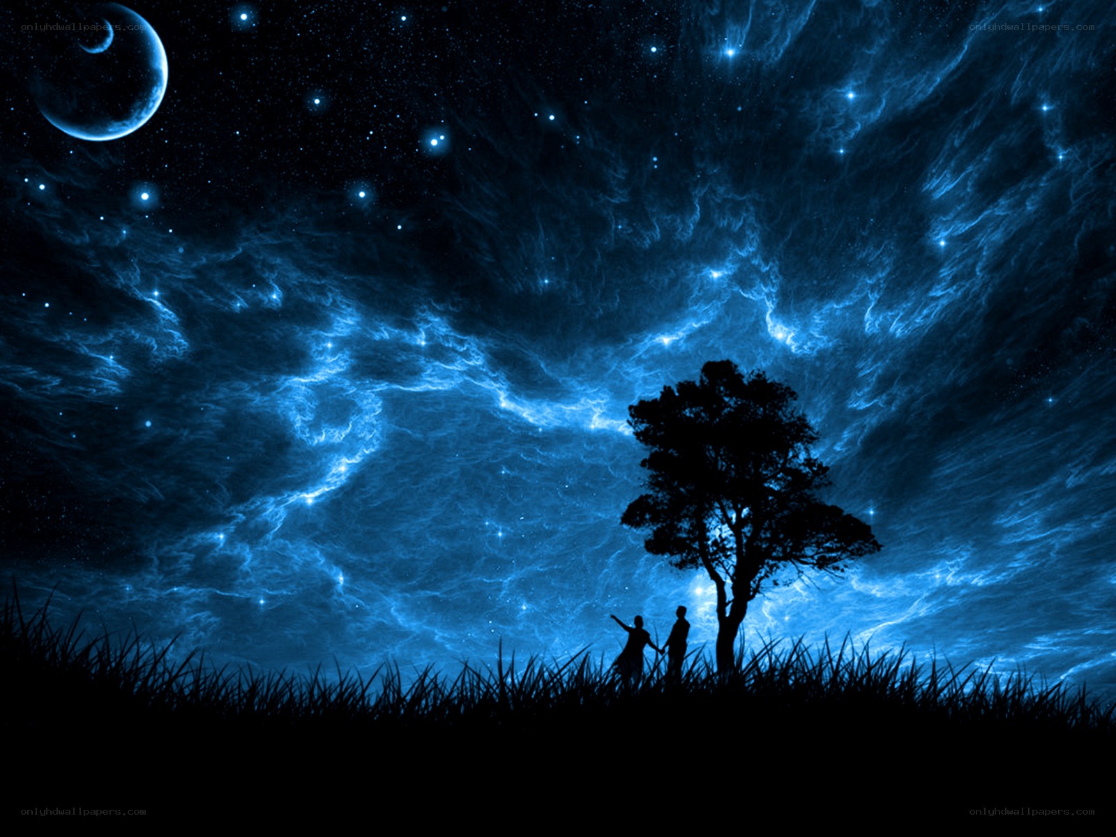 Couple under starry night sky