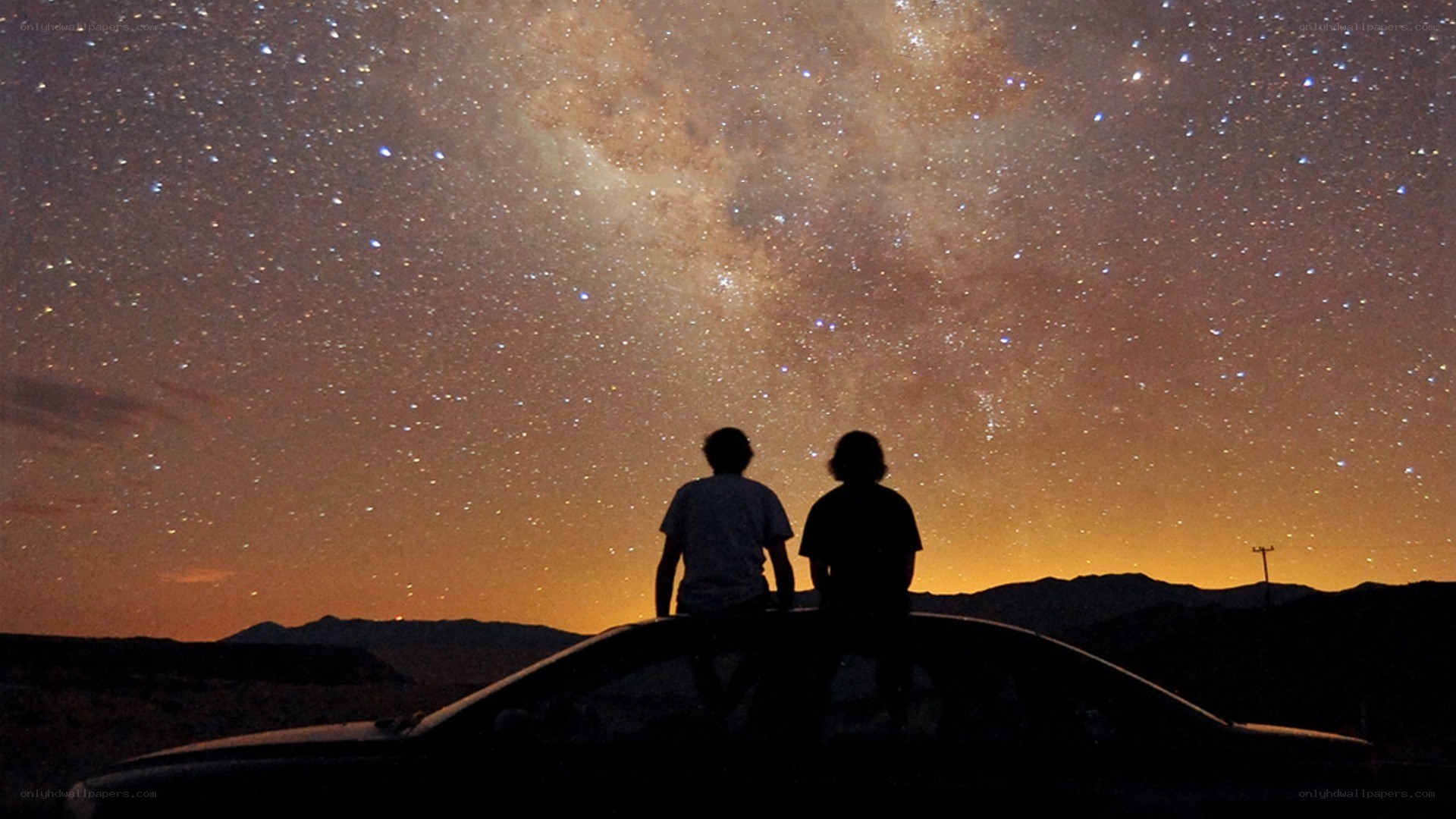 Couple under starry sky