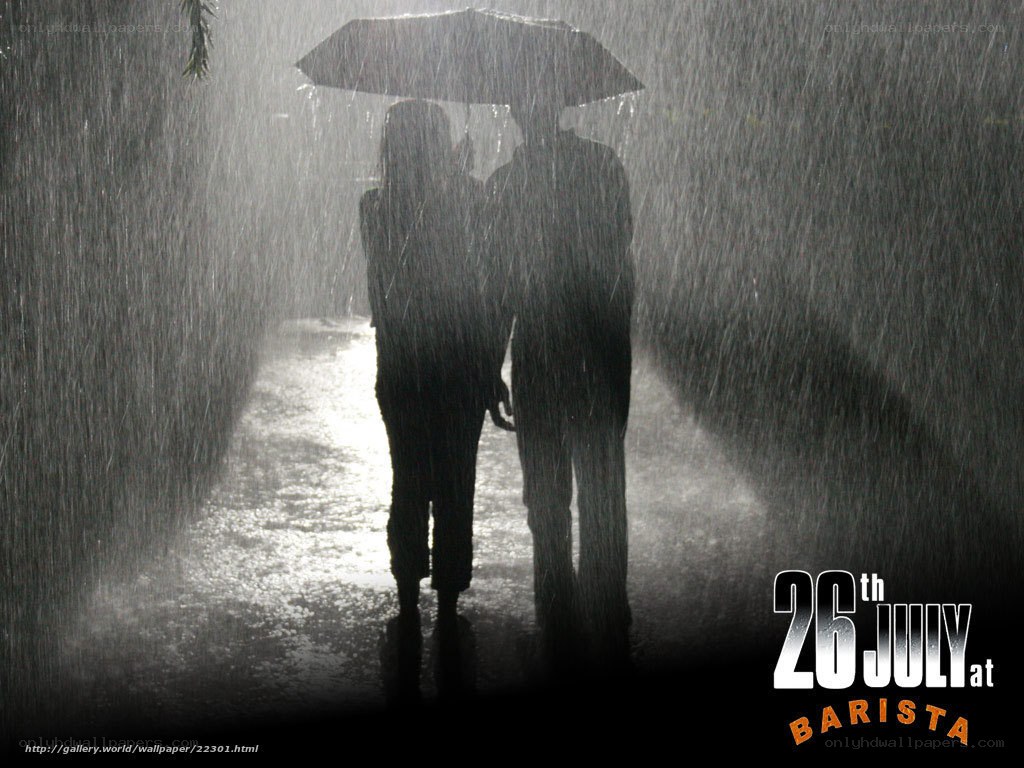 Couple under umbrella in rain