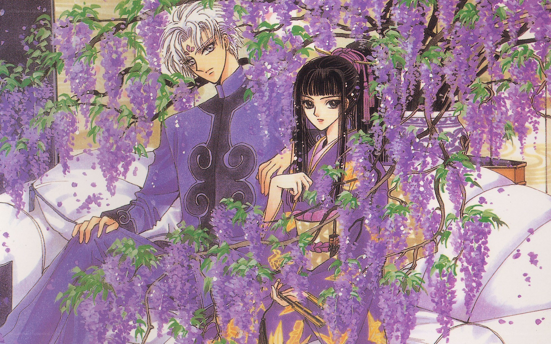 couple under wisteria blossoms