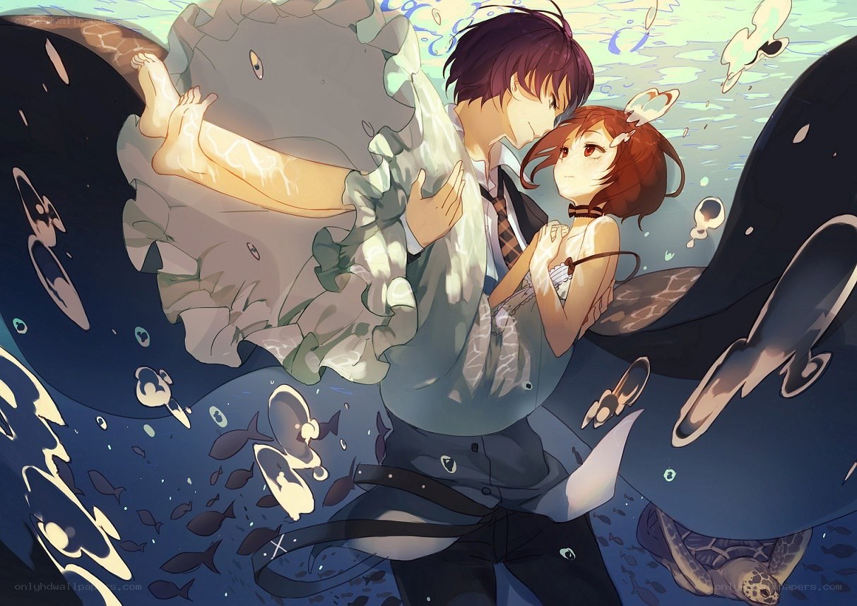 couple underwater embrace