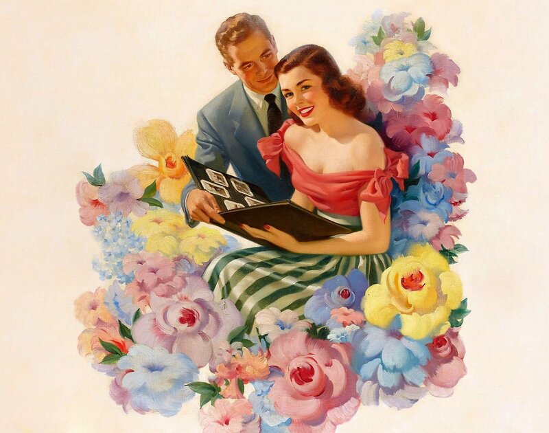 Couple Viewing Photo Album