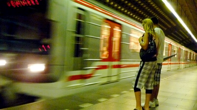 Couple Waiting on Subway Platform