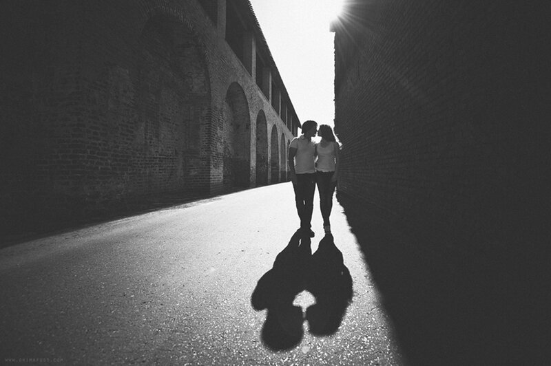 Couple Walking in Alley — Black