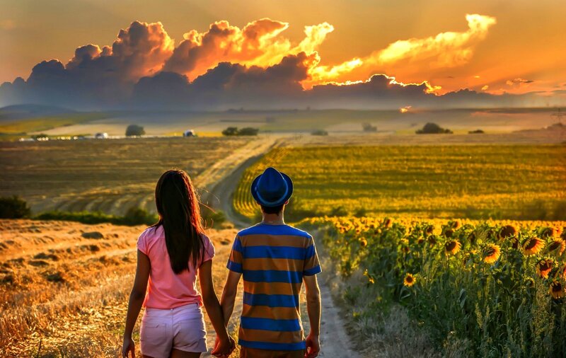 Couple Walking in Field — Orange