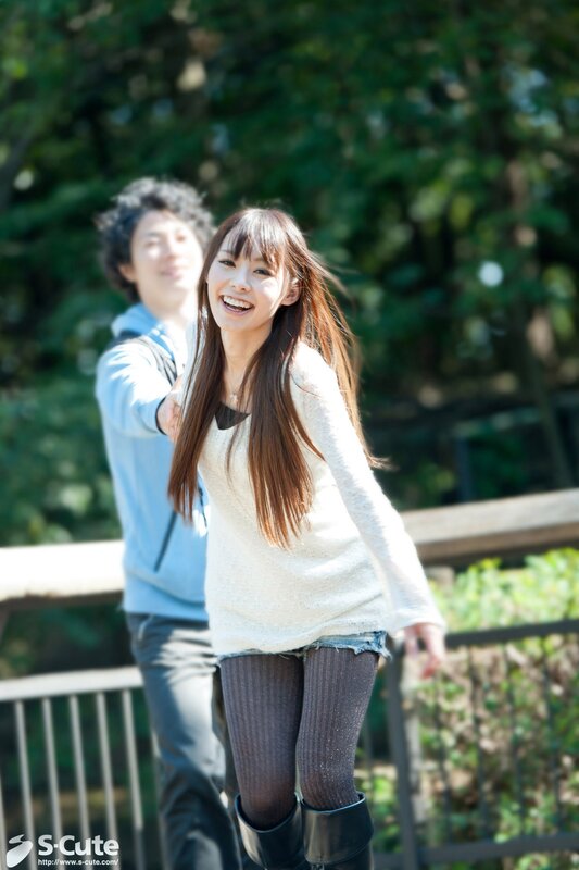 Couple walking in park
