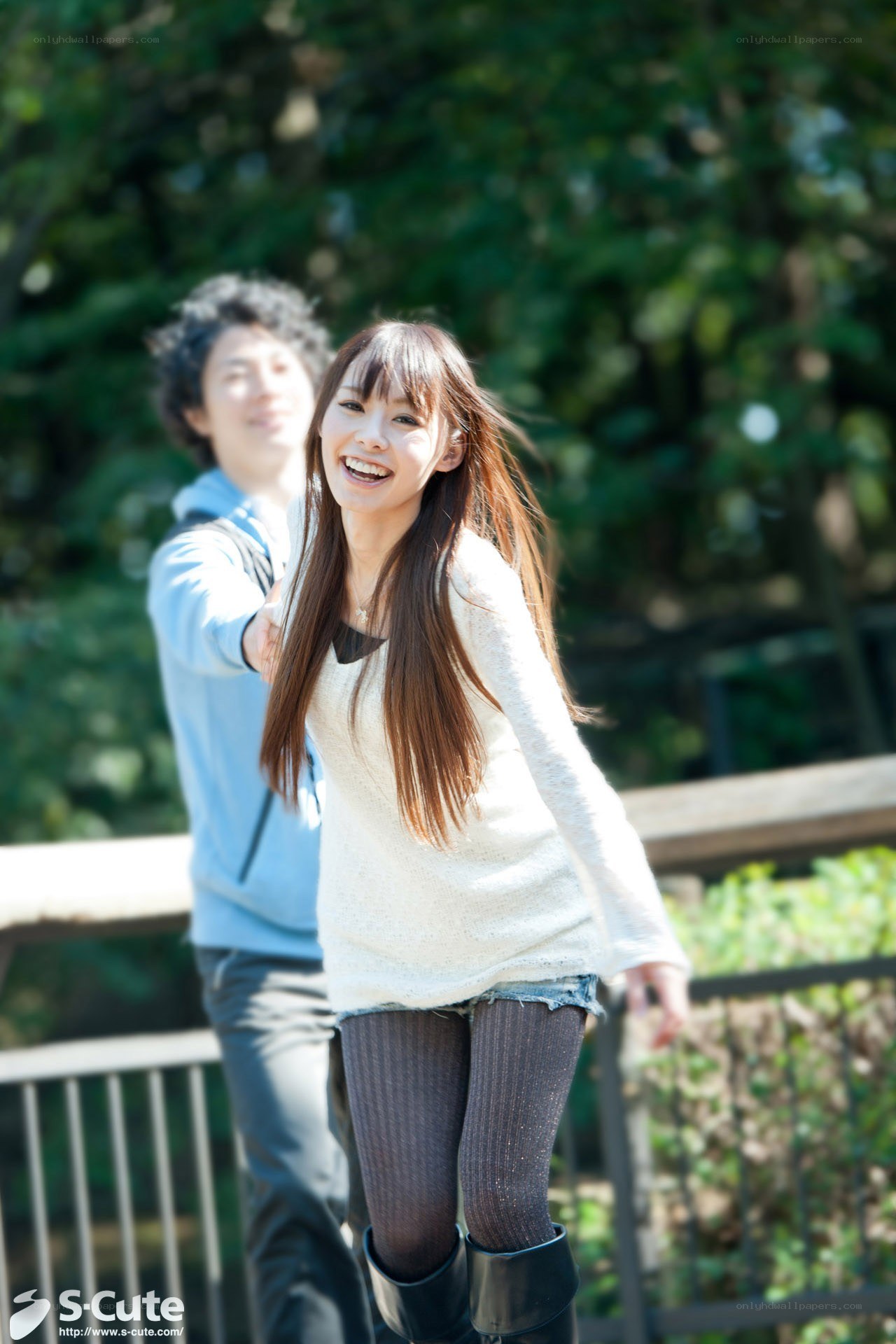 Couple walking in park