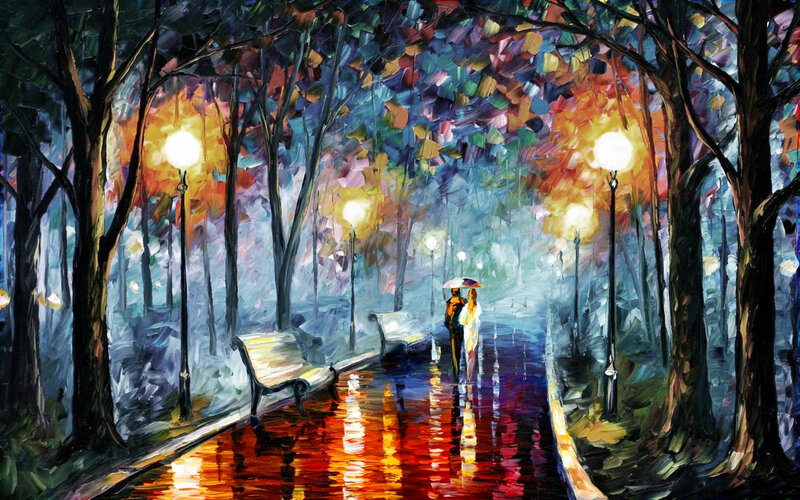 Couple walking in rainy park