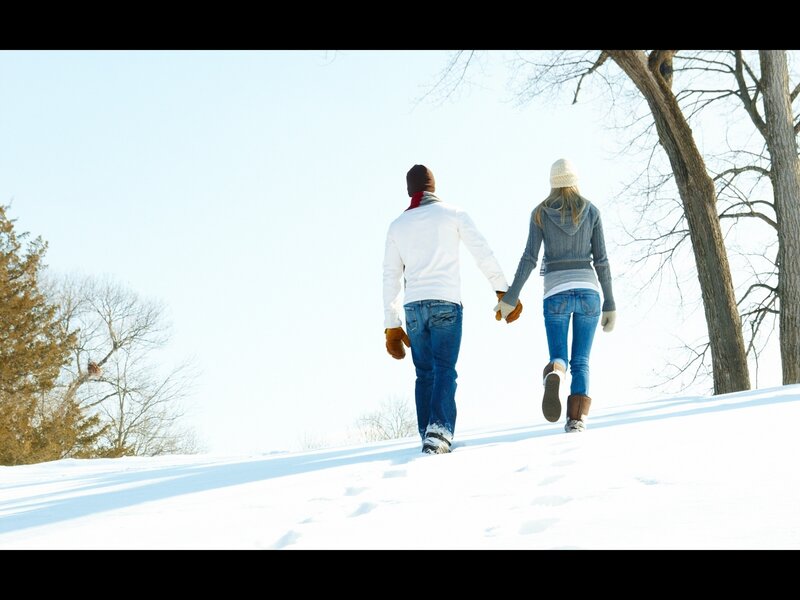 Couple walking in snow