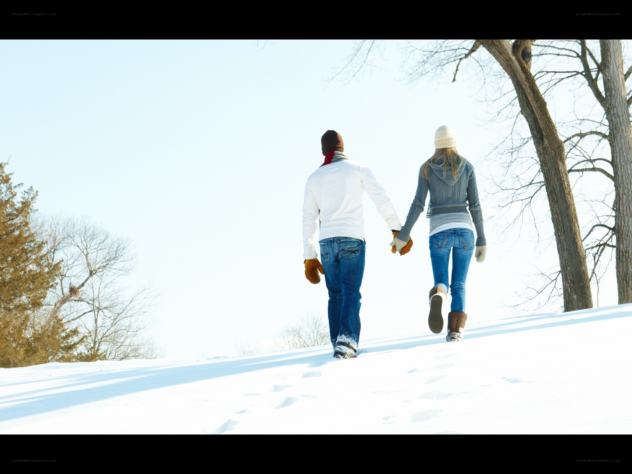 Couple walking in snow