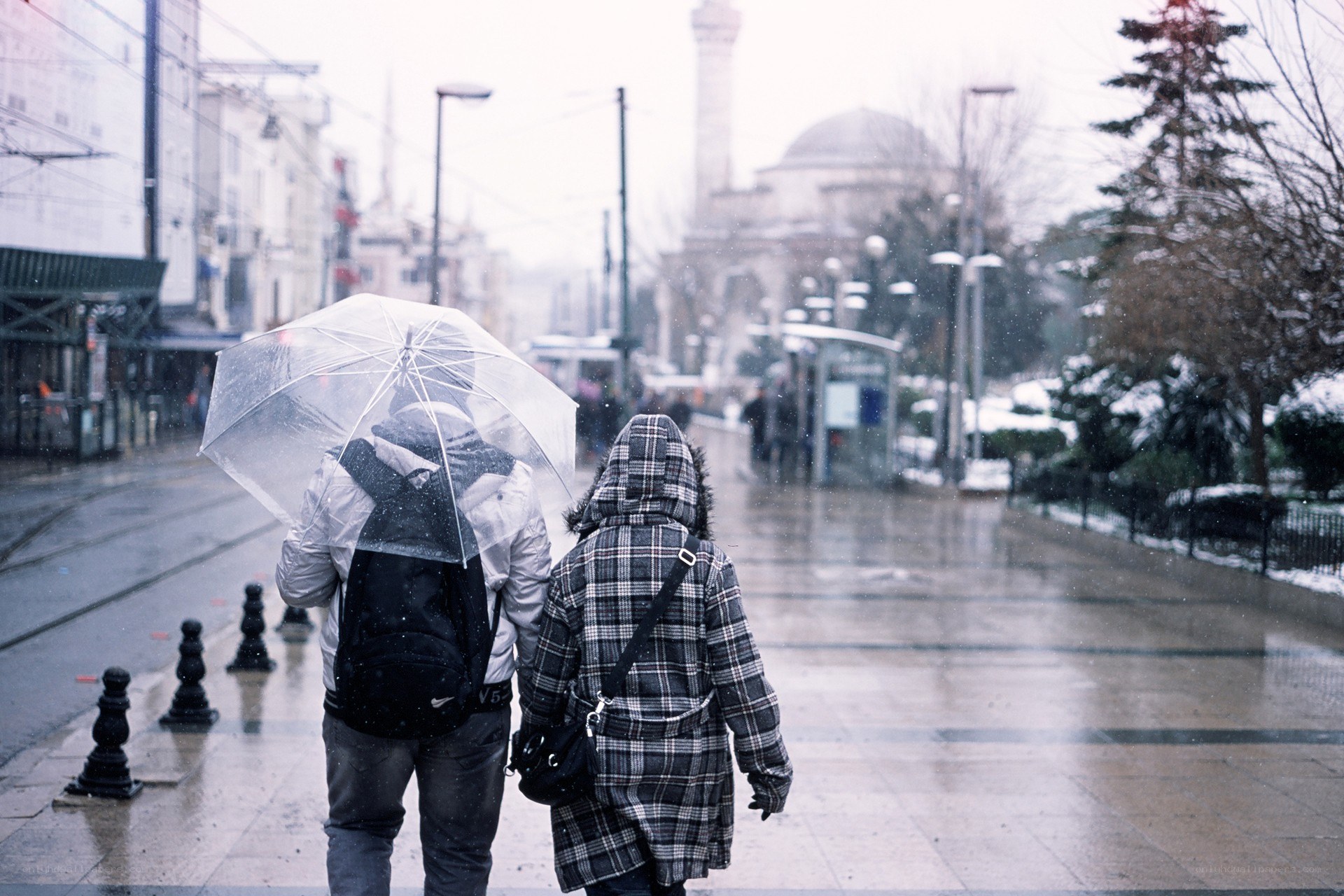 Couple walking in snow